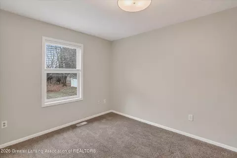 Bedroom - 6902 E Clark Rd, Bath, MI 48808 photo 4 of 7