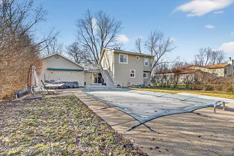 Exterior - 1225 Schavey Rd, Dewitt, MI 48820 photo 4 of 9