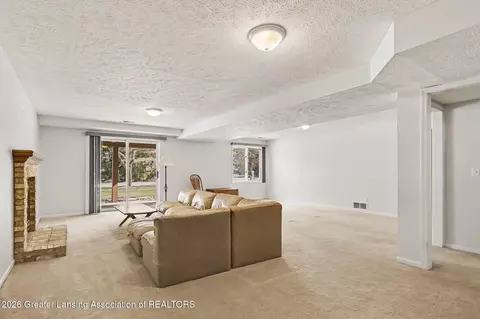 Living - 1026 Brookside Dr, Lansing, MI 48917 photo 2 of 4