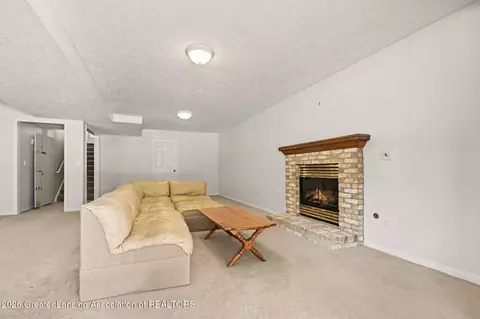 Living - 1026 Brookside Dr, Lansing, MI 48917 photo 3 of 4