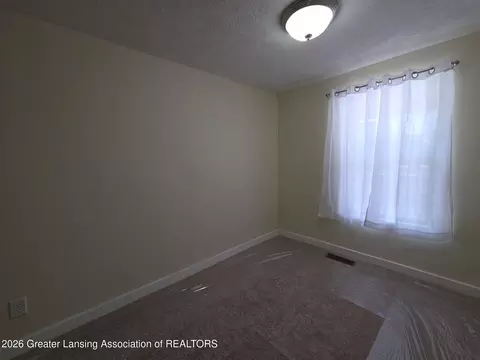 Bedroom - 205 E Thomas St, Lansing, MI 48906 photo 1 of 2