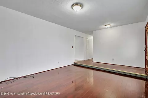 Living - 3945 Windward Dr, Lansing, MI 48911 photo 2 of 3