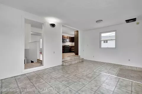 Living - 3945 Windward Dr, Lansing, MI 48911 photo 3 of 3