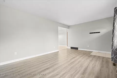 Living - 3783 Wisteria Ln, Dewitt, MI 48820 photo 2 of 3