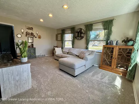 Living - 2201 N Aurelius Rd, Holt, MI 48842 photo 2 of 2
