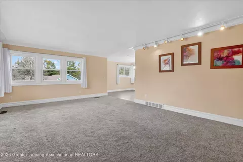 Living - 13780 Hamersley Dr, Bath, MI 48808 photo 3 of 4
