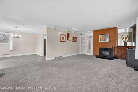 Living - 13780 Hamersley Dr, Bath, MI 48808 photo 4 of 4