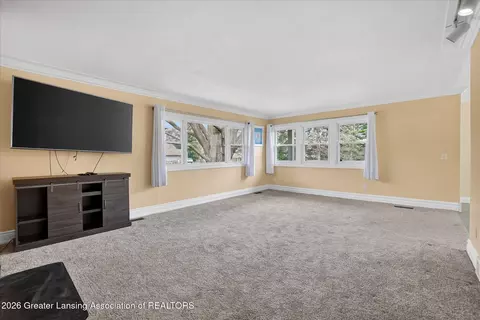Living - 13780 Hamersley Dr, Bath, MI 48808 photo 2 of 4
