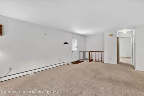 Living - 976 Riverview Ct, Williamston, MI 48895 photo 2 of 4