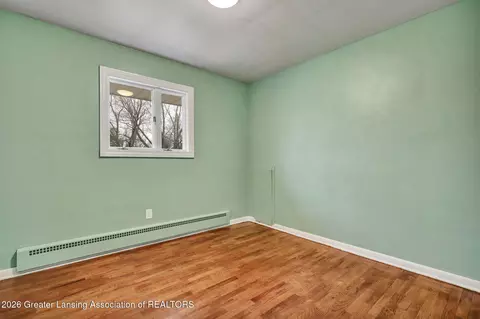 Bedroom - 12349 Broadbent Rd, Lansing, MI 48917 photo 4 of 6
