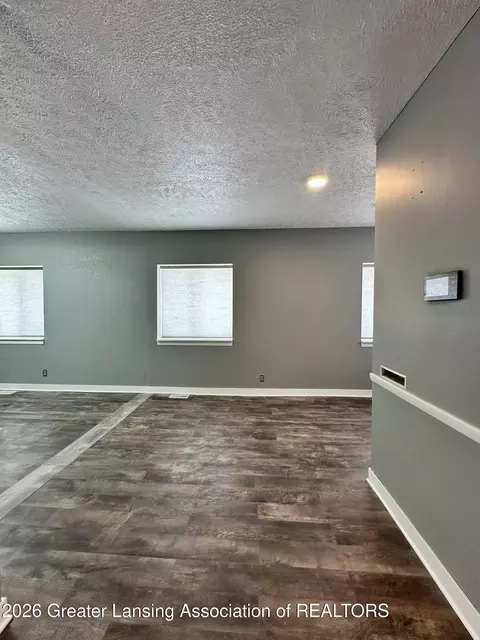 Living - 600 E Cavanaugh Rd, Lansing, MI 48910 photo 1 of 4