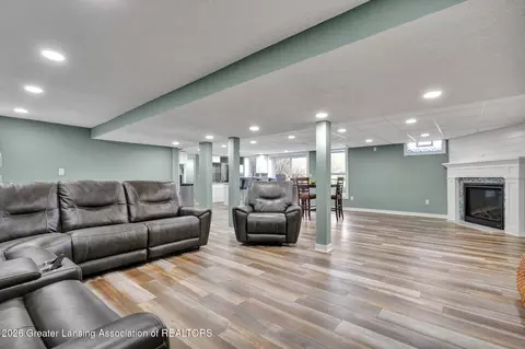 Living - 7360 Delta River Dr, Lansing, MI 48906 photo 2 of 2