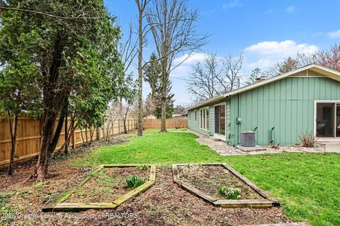 Exterior - 318 N Circle Dr, Williamston, MI 48895 photo 7 of 9