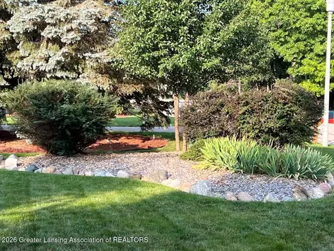 Exterior - 704 Larchmont St, Dewitt, MI 48820 photo 4 of 12
