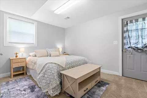 Bedroom - 1210 W Herbison Rd, Dewitt, MI 48820 photo 4 of 5
