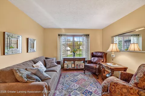 Living - 13964 Adeline Dr, Lansing, MI 48906 photo 2 of 3