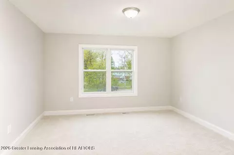 Bedroom - 3600 Otsego Dr, Okemos, MI 48864 photo 6 of 10