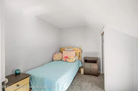 Bedroom - 4113 Dell Rd, Lansing, MI 48911 photo 6 of 9