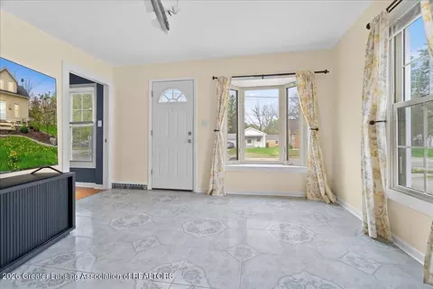 Living - 306 E Cavanaugh Rd, Lansing, MI 48910 photo 1 of 1