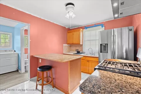 Kitchen - 306 E Cavanaugh Rd, Lansing, MI 48910 photo 1 of 3