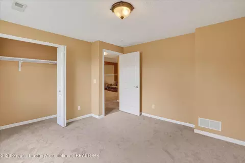 Bedroom - 14301 S Kyle Rd, Haslett, MI 48840 photo 7 of 9