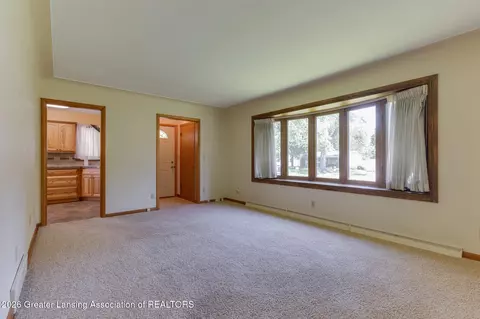Living - 15178 Chetwyn Dr, Lansing, MI 48906 photo 2 of 2