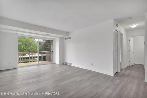 Living - 1747 Maple Ridge Rd #17, Haslett, MI 48840 photo 2 of 4