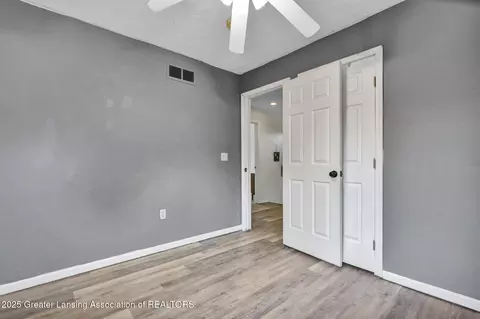 Bedroom - 11877 W Herbison Rd, Eagle, MI 48822 photo 6 of 11