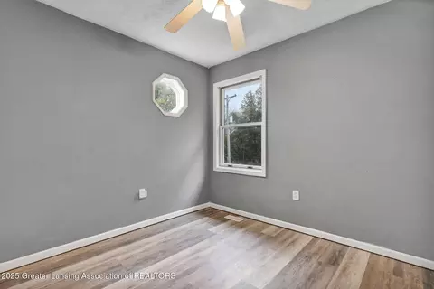 Bedroom - 11877 W Herbison Rd, Eagle, MI 48822 photo 7 of 11