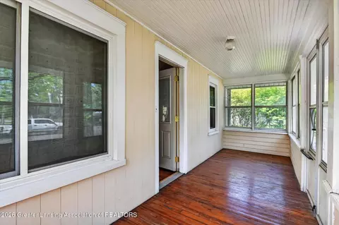 Exterior - 702 E Cavanaugh Rd, Lansing, MI 48910 photo 3 of 9
