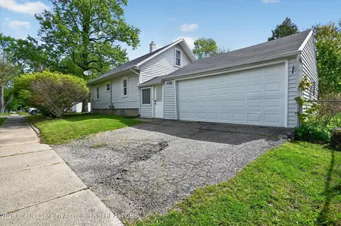 Exterior - 702 E Cavanaugh Rd, Lansing, MI 48910 photo 2 of 9