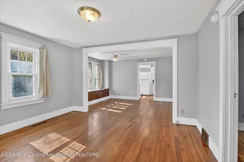 Living - 702 E Cavanaugh Rd, Lansing, MI 48910 photo 1 of 4