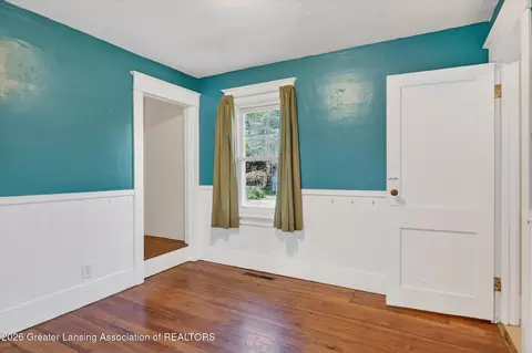 Bedroom - 702 E Cavanaugh Rd, Lansing, MI 48910 photo 1 of 5
