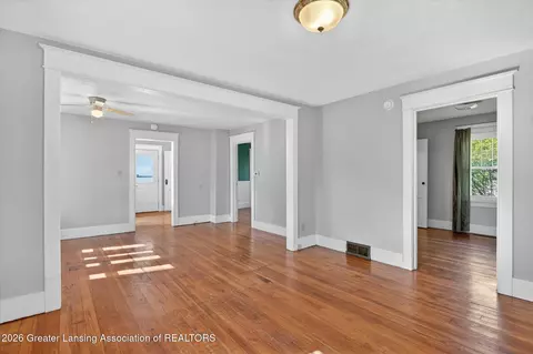 Living - 702 E Cavanaugh Rd, Lansing, MI 48910 photo 2 of 4