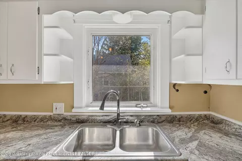 Kitchen - 702 E Cavanaugh Rd, Lansing, MI 48910 photo 3 of 3