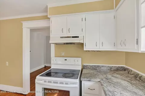 Kitchen - 702 E Cavanaugh Rd, Lansing, MI 48910 photo 2 of 3