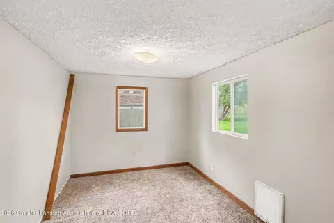Bedroom - 710 W State St, Saint Johns, MI 48879 photo 2 of 4
