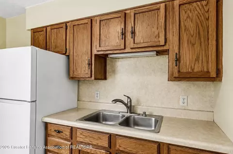 Kitchen - 327 E Middle St, Williamston, MI 48895 photo 2 of 3