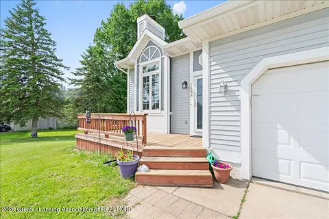 Exterior - 1628 W Herbison Dr, Dewitt, MI 48820 photo 3 of 12