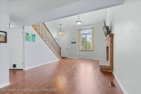 Living - 1628 W Herbison Dr, Dewitt, MI 48820 photo 1 of 3