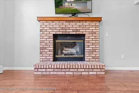 Living - 1628 W Herbison Dr, Dewitt, MI 48820 photo 3 of 3