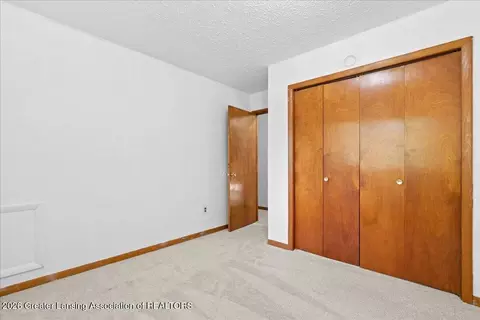 Bedroom - 1628 W Herbison Dr, Dewitt, MI 48820 photo 3 of 4