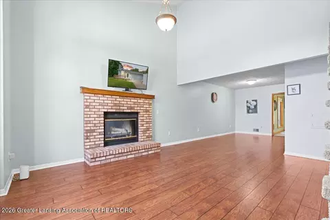 Living - 1628 W Herbison Dr, Dewitt, MI 48820 photo 2 of 3