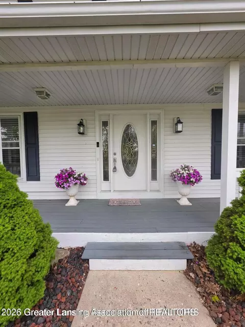 Exterior - 301 Windy Rush Ln, Dewitt, MI 48820 photo 3 of 20