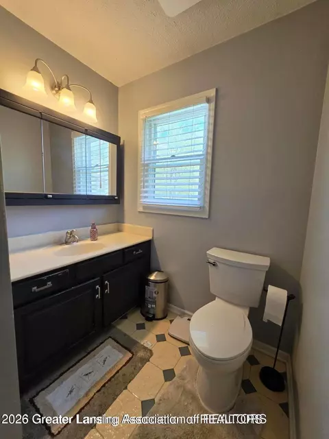 Bath - 301 Windy Rush Ln, Dewitt, MI 48820 photo 1 of 2