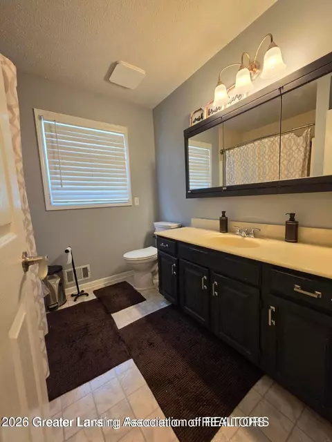 Bath - 301 Windy Rush Ln, Dewitt, MI 48820 photo 2 of 2