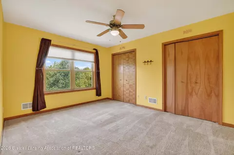 Bedroom - 1300 E Round Lake Rd, Dewitt, MI 48820 photo 2 of 4