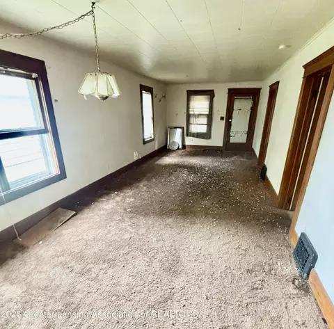 Living - 2212 Lyons Ave, Lansing, MI 48910 photo 1 of 2