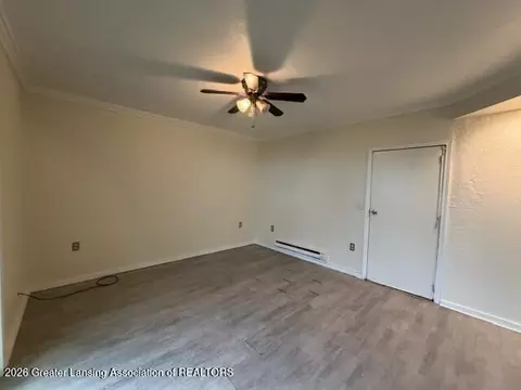 Living - 1027 Cooper Ave, Lansing, MI 48910 photo 3 of 4