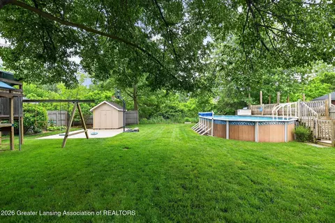 Exterior - 421 White Oak Dr, Perry, MI 48872 photo 8 of 12